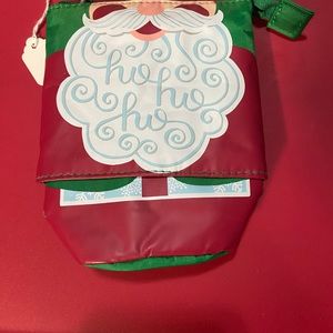 NWT HIDE AND PEEK POUCH